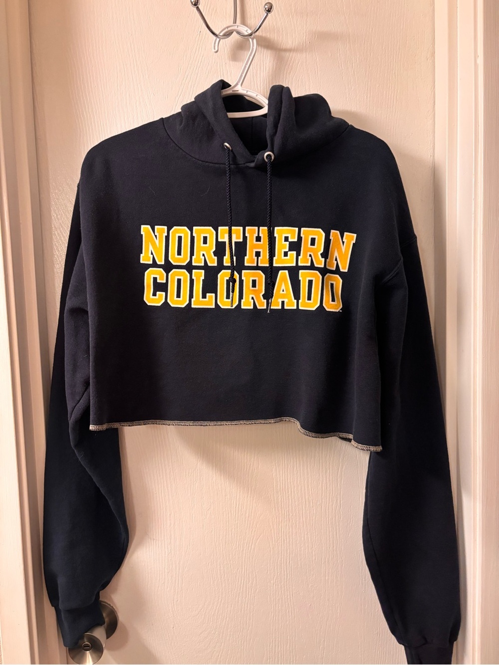 Champion Navy Blue Cropped Cowl Neck Sweatshirt with Yellow Lettering